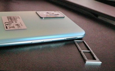 OPPO A76 right side has the SIM tray and volume rocker OPPO A76 right side has the SIM tray and volume rocker