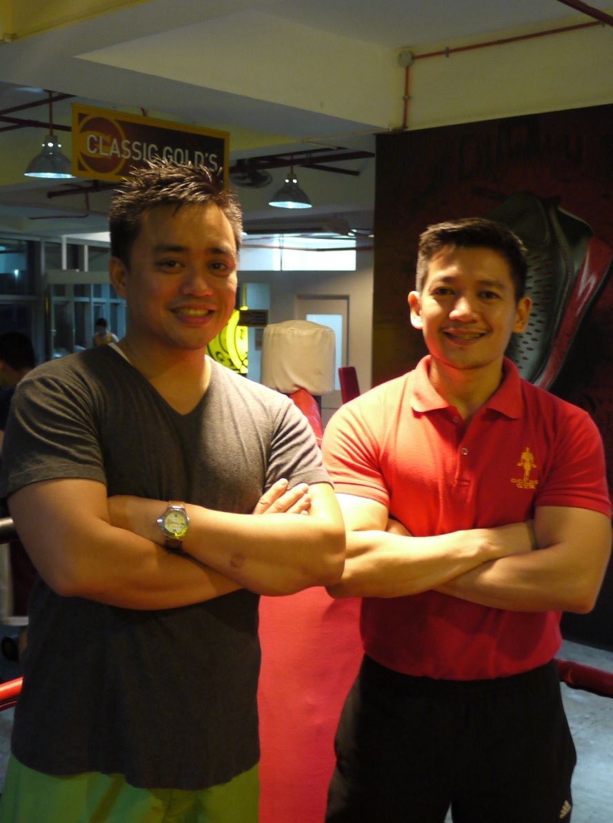 GNC Burn 60 Challenge winner Cush Evangelista (left) keeps fit and healthy with the help of GNC and trainer Archie Luna